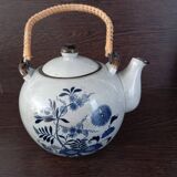 Tea service, teapot and five bowls in oriental style.