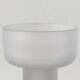 Sculptural candle holder in frosted glass.