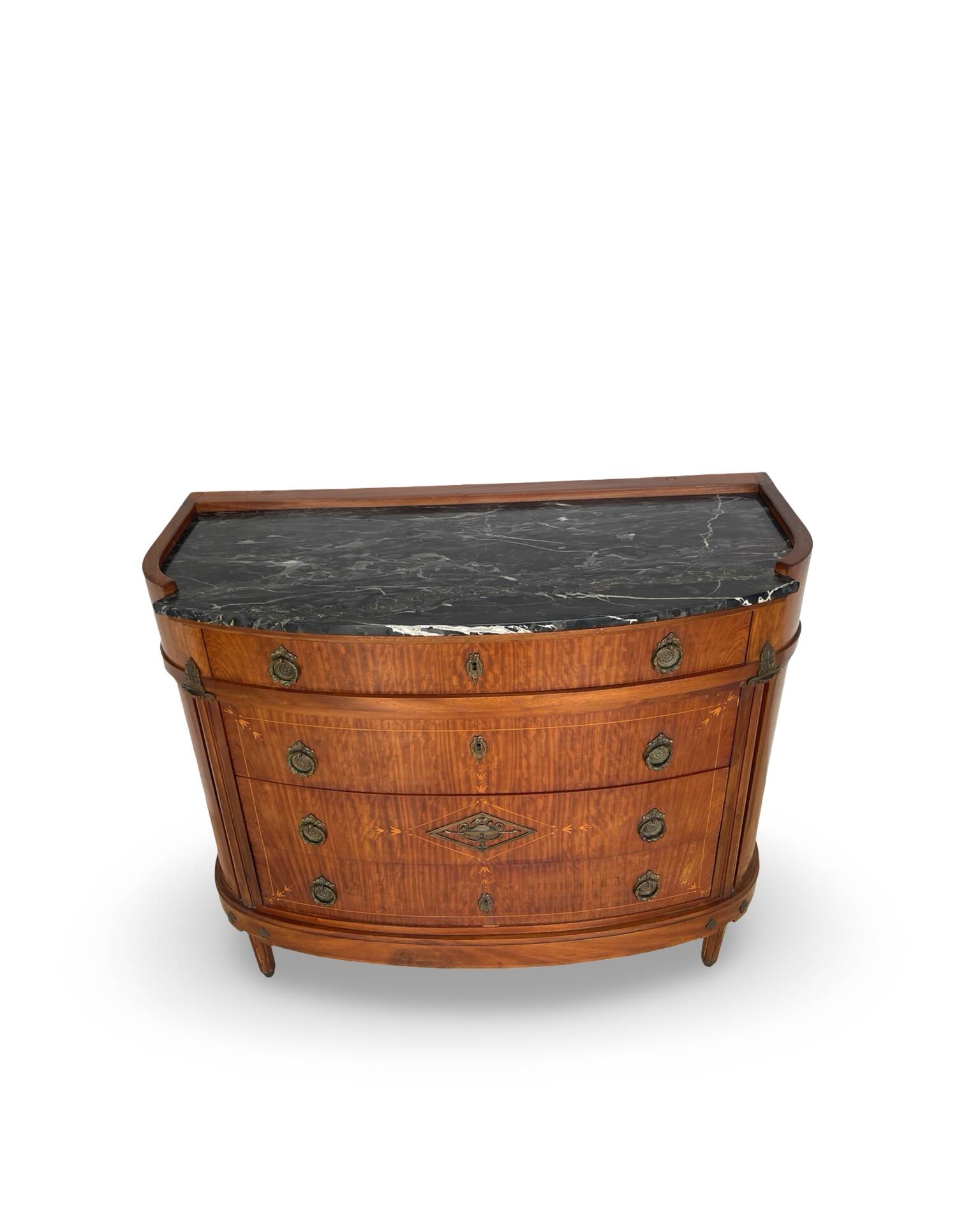 The demi-lune commode/ chest of drawers