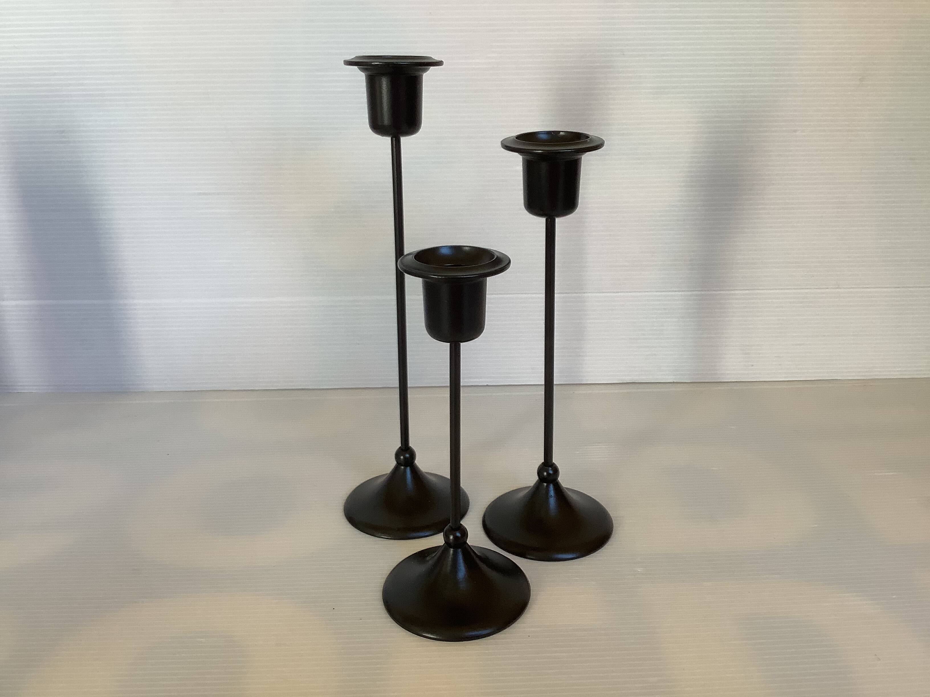 Trio of Scandinavian candlesticks with black tulip base
