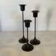 Trio of Scandinavian candlesticks with black tulip base