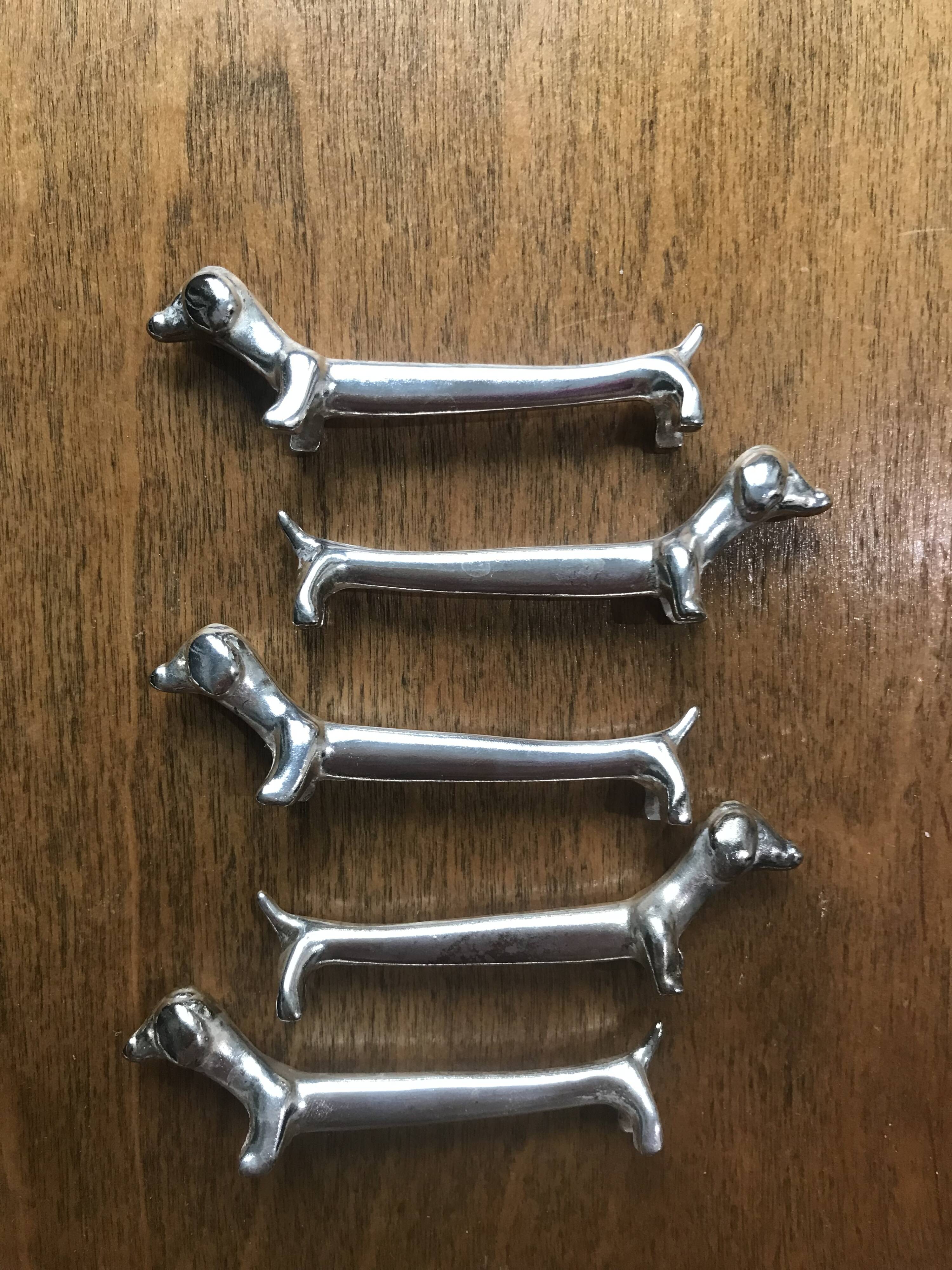Set of five vintage basset hound knife holders