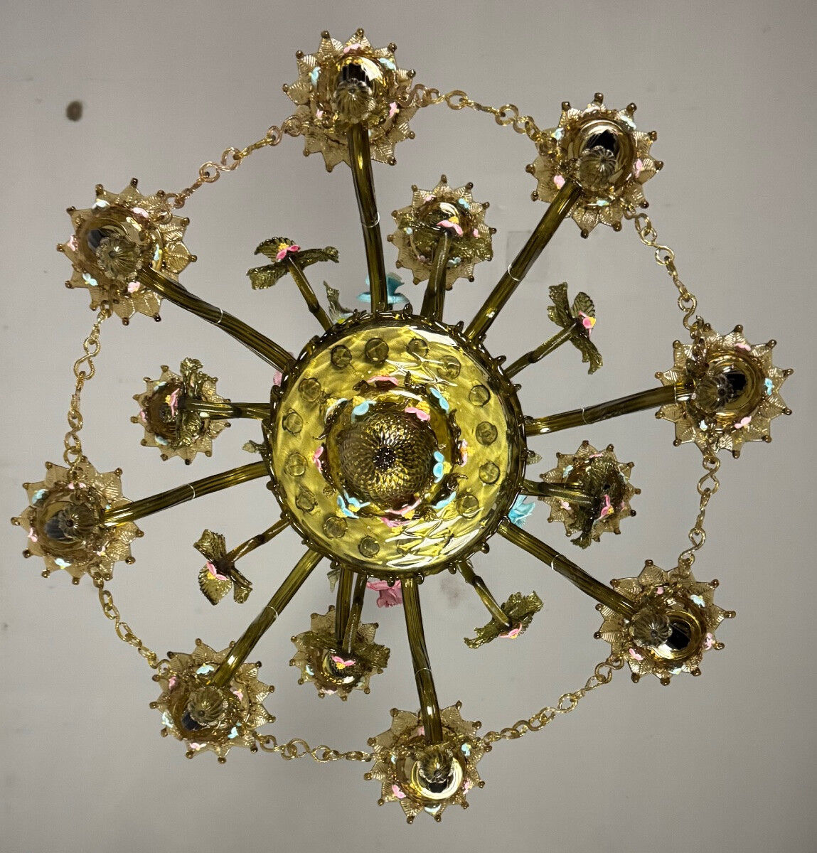 Venetian chandelier in multi-colored Murano glass with a green dominant color, 12 light arms, circa 1880