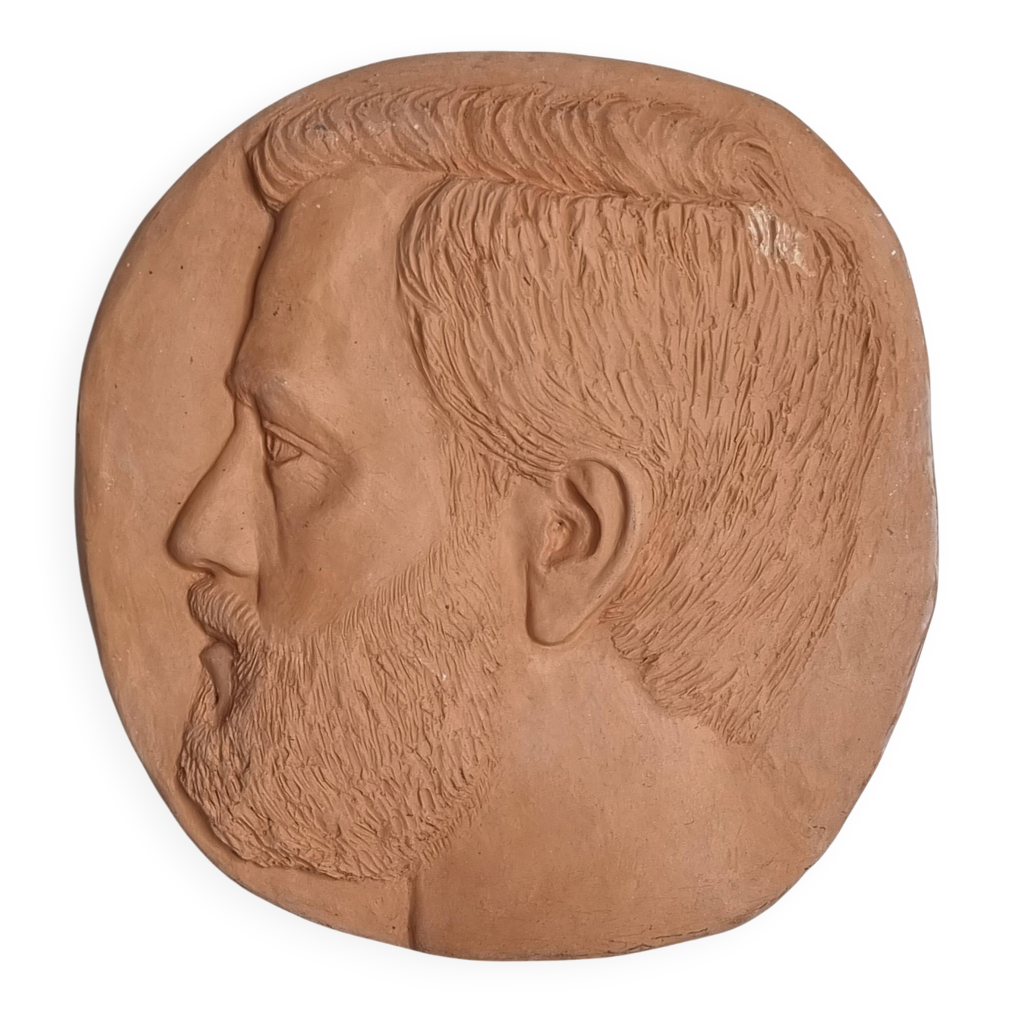 Bas-relief mural in terracotta, profile of a man, signed, 21 x 20 cm, 1984.