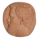 Bas-relief mural in terracotta, profile of a man, signed, 21 x 20 cm, 1984.