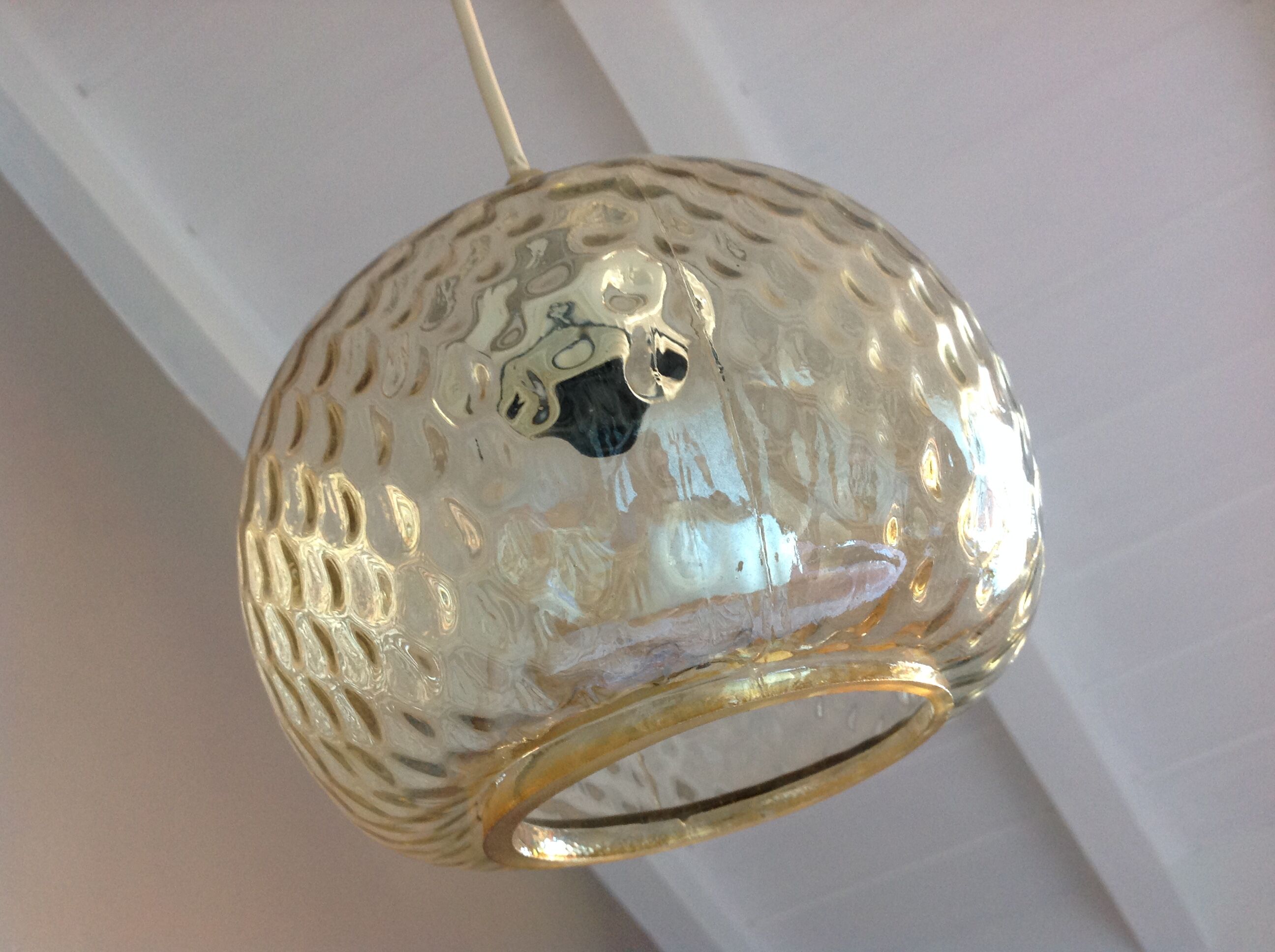 Globe pendant lamp in bubbled amber glass / vintage 60s-70s