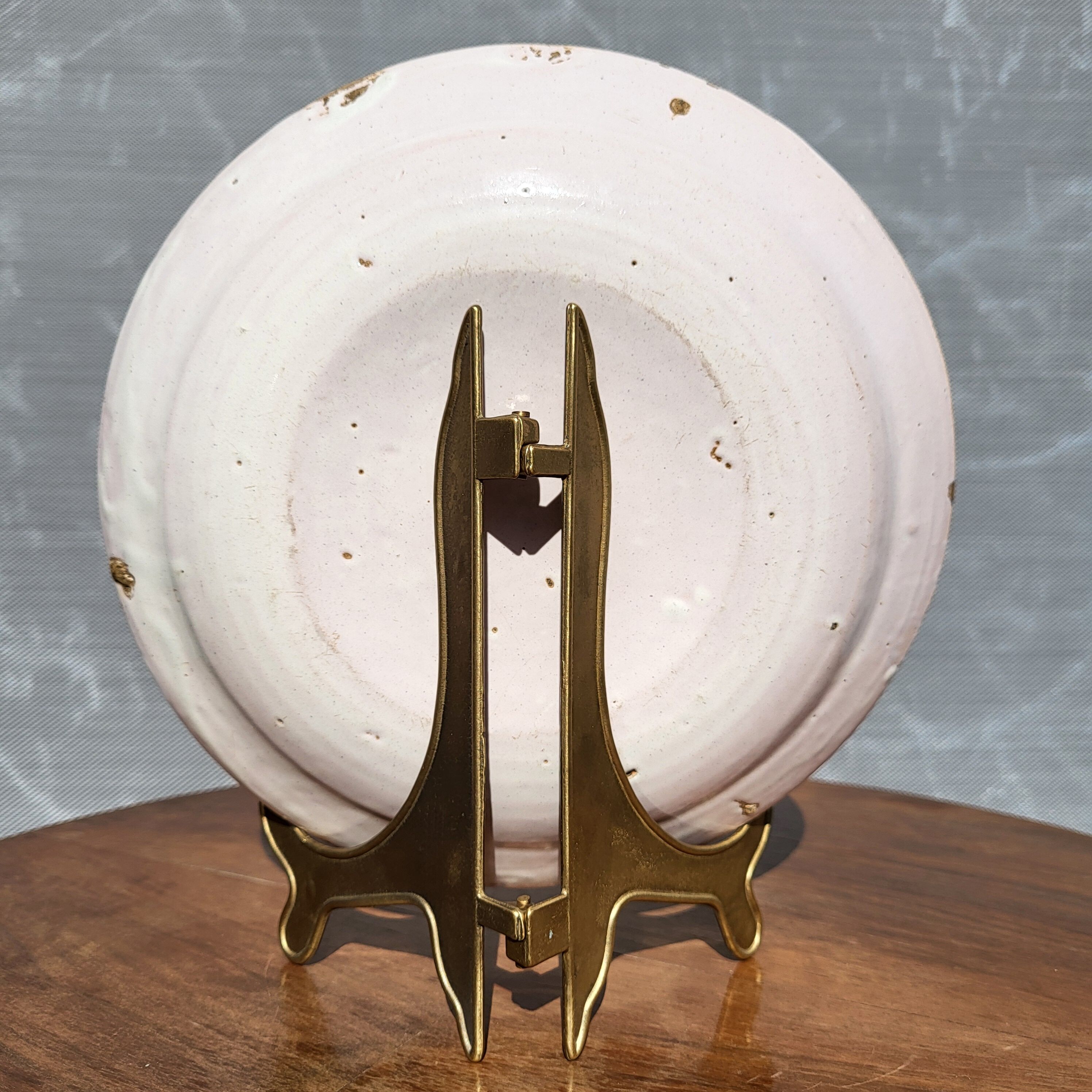 Grand Feu earthenware plate, Manganese decoration - 18th century