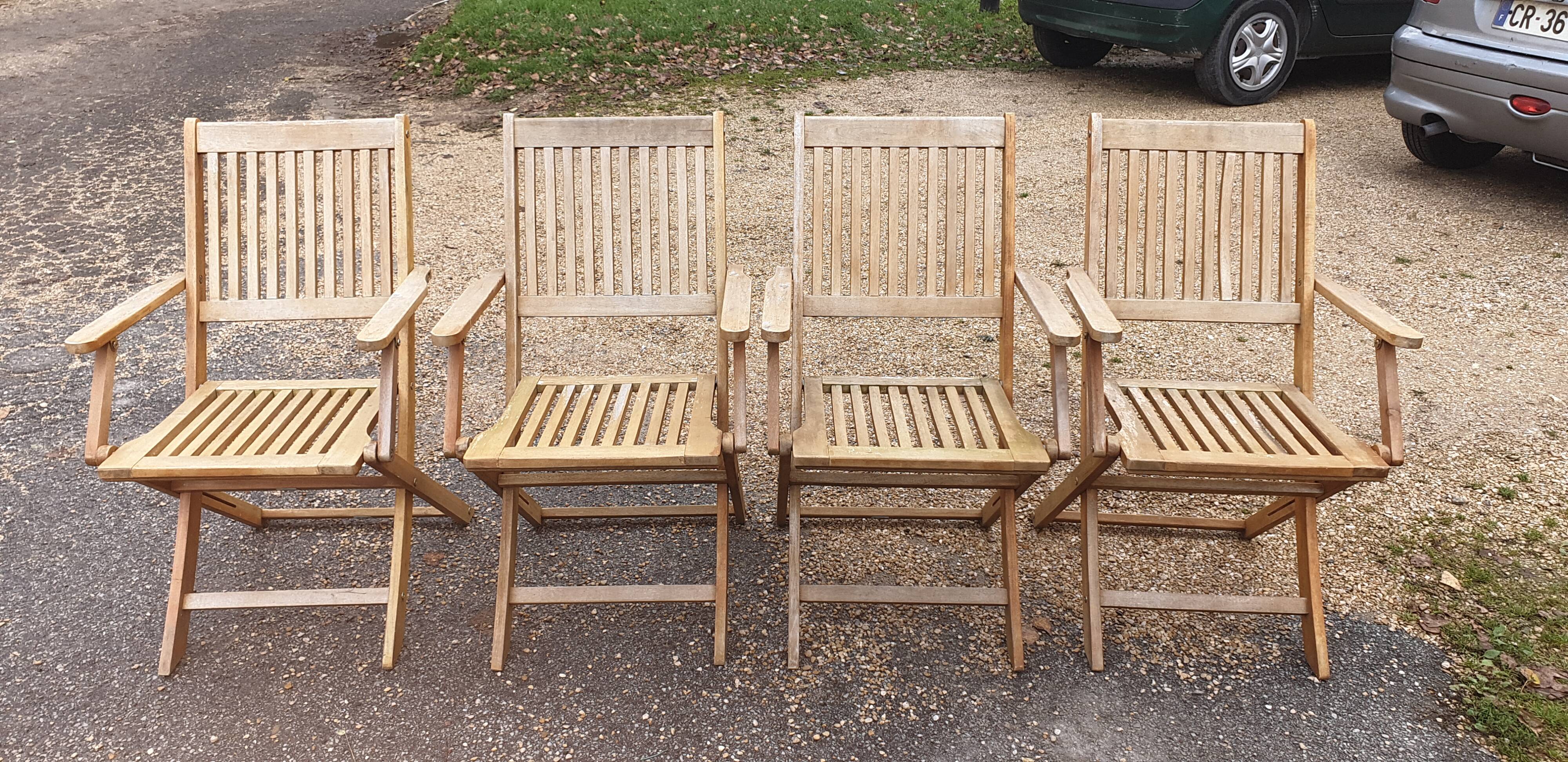 Teak garden armchairs