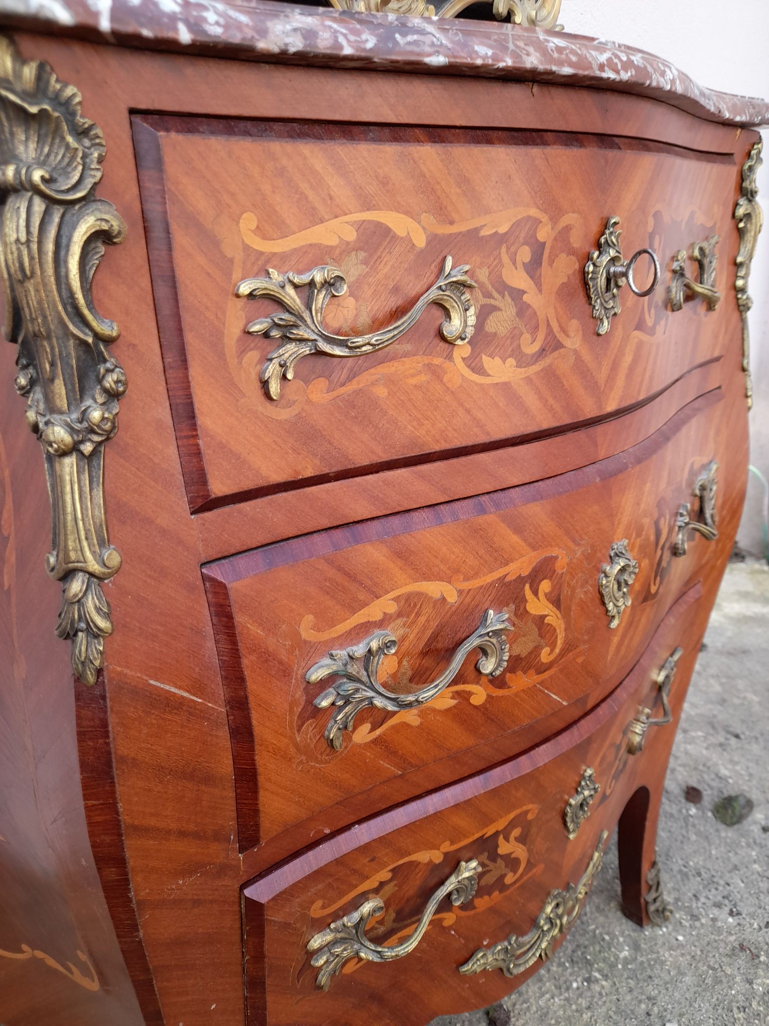 Louis xv style chest of drawers in rosewood marquetry