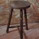 Tripod stool with turned legs