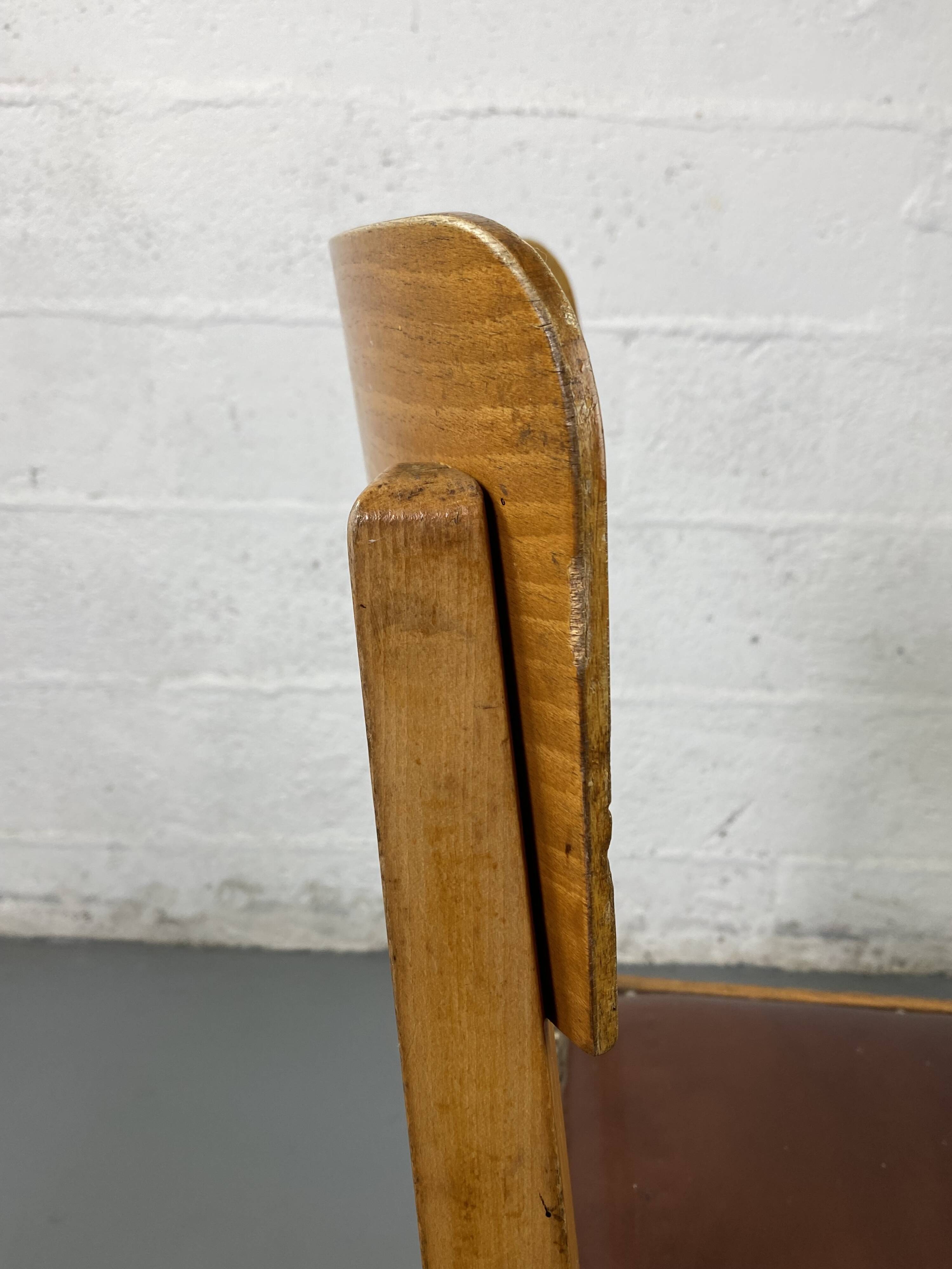 Pair of wooden and leather chairs