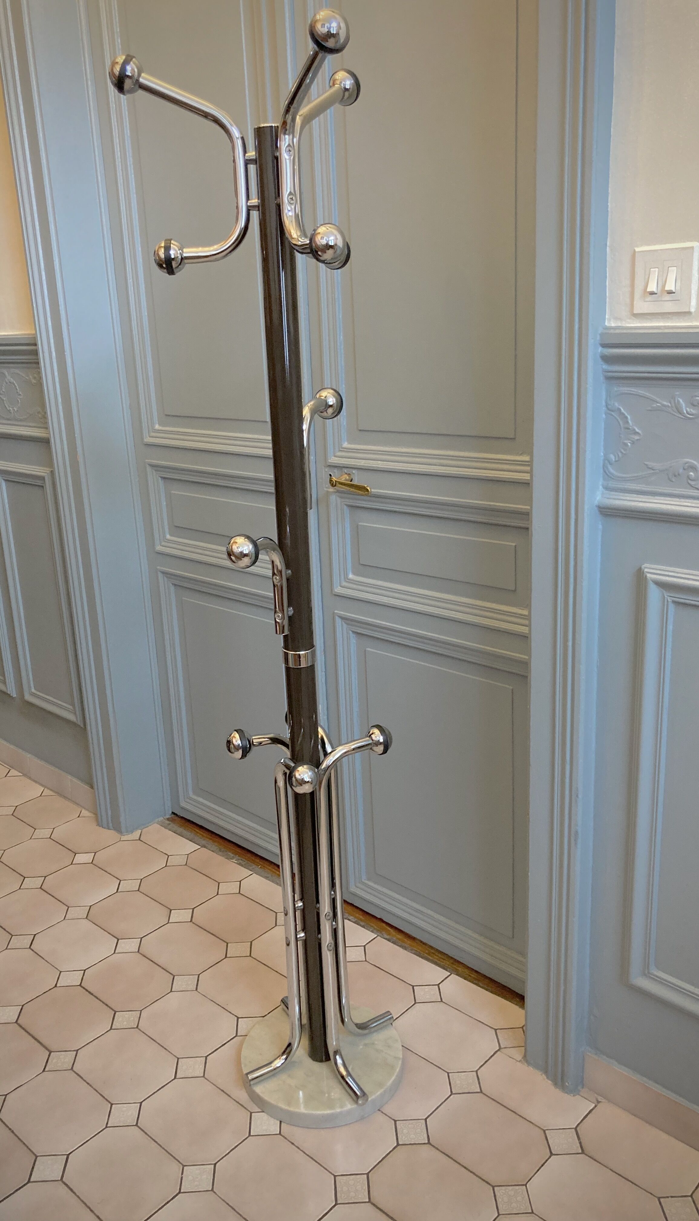 Coat rack on vintage stand