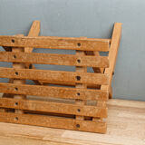 Lathy folding stool made of wood
