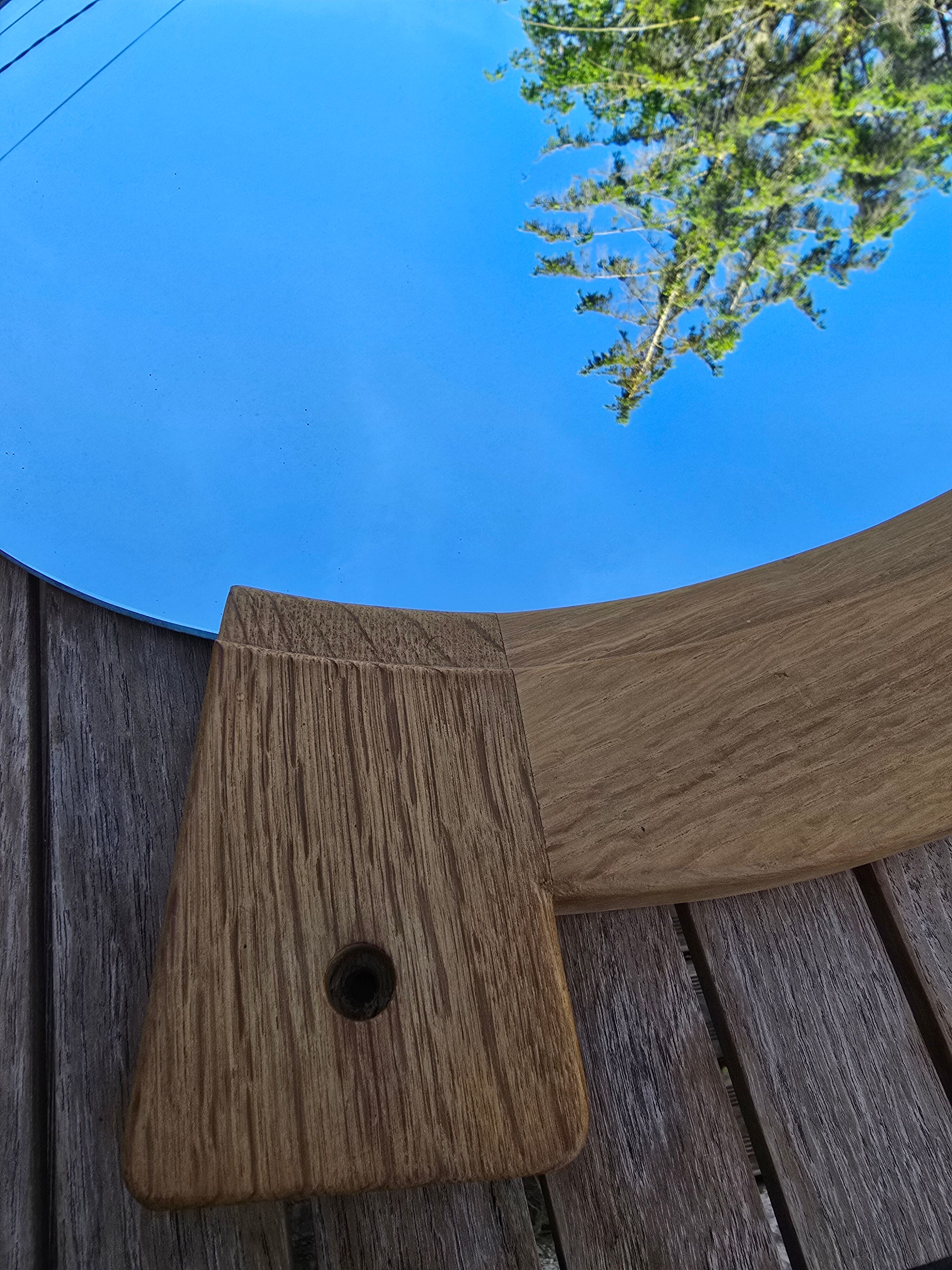 Oval mirror by Guillerme and Chambron