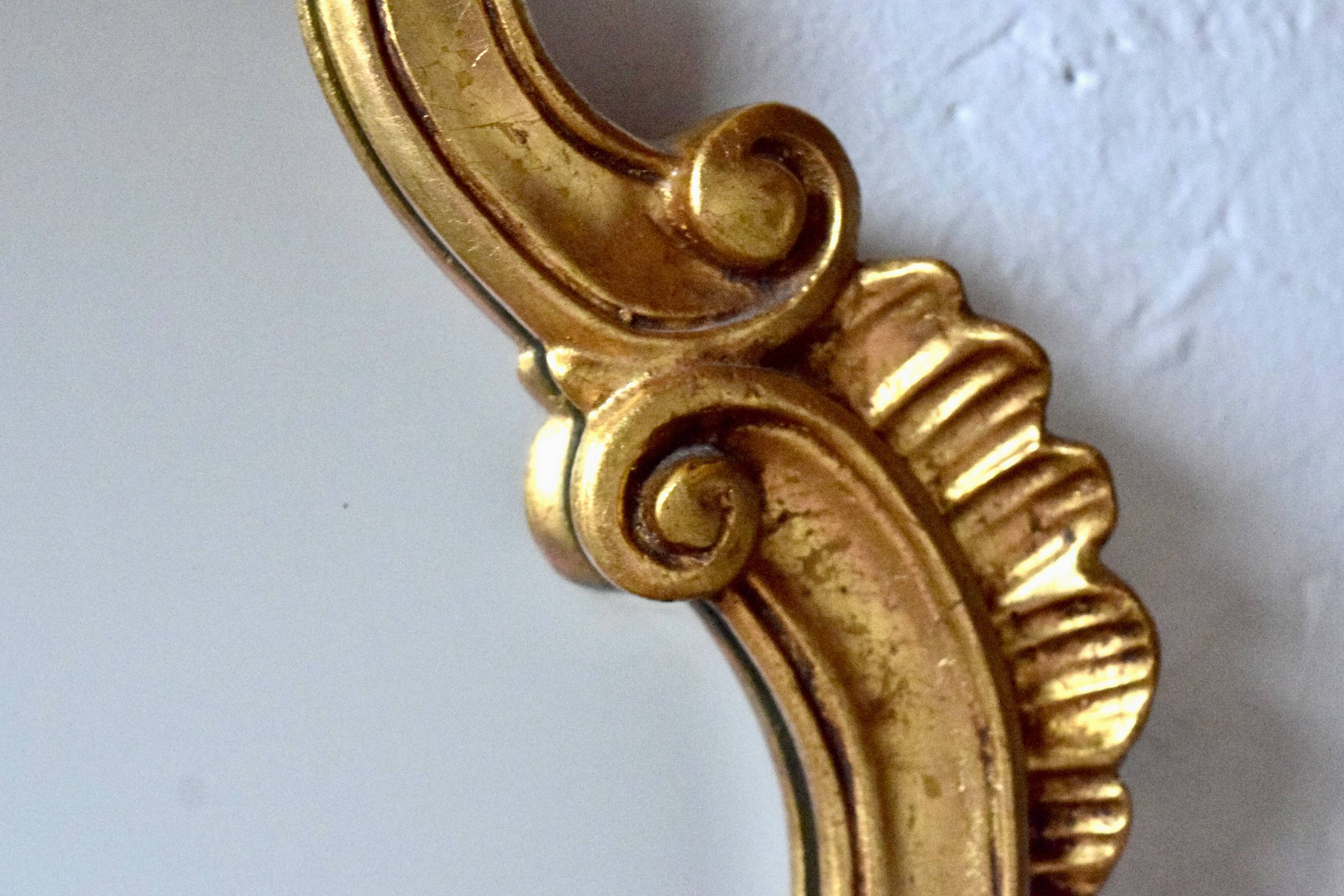 Old wall mirror in golden resin - rococo style