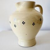 Vintage butter yellow ceramic pitcher in rustic style