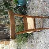 Solid oak table with 3 extension cords, 6 oak chairs with straw seat