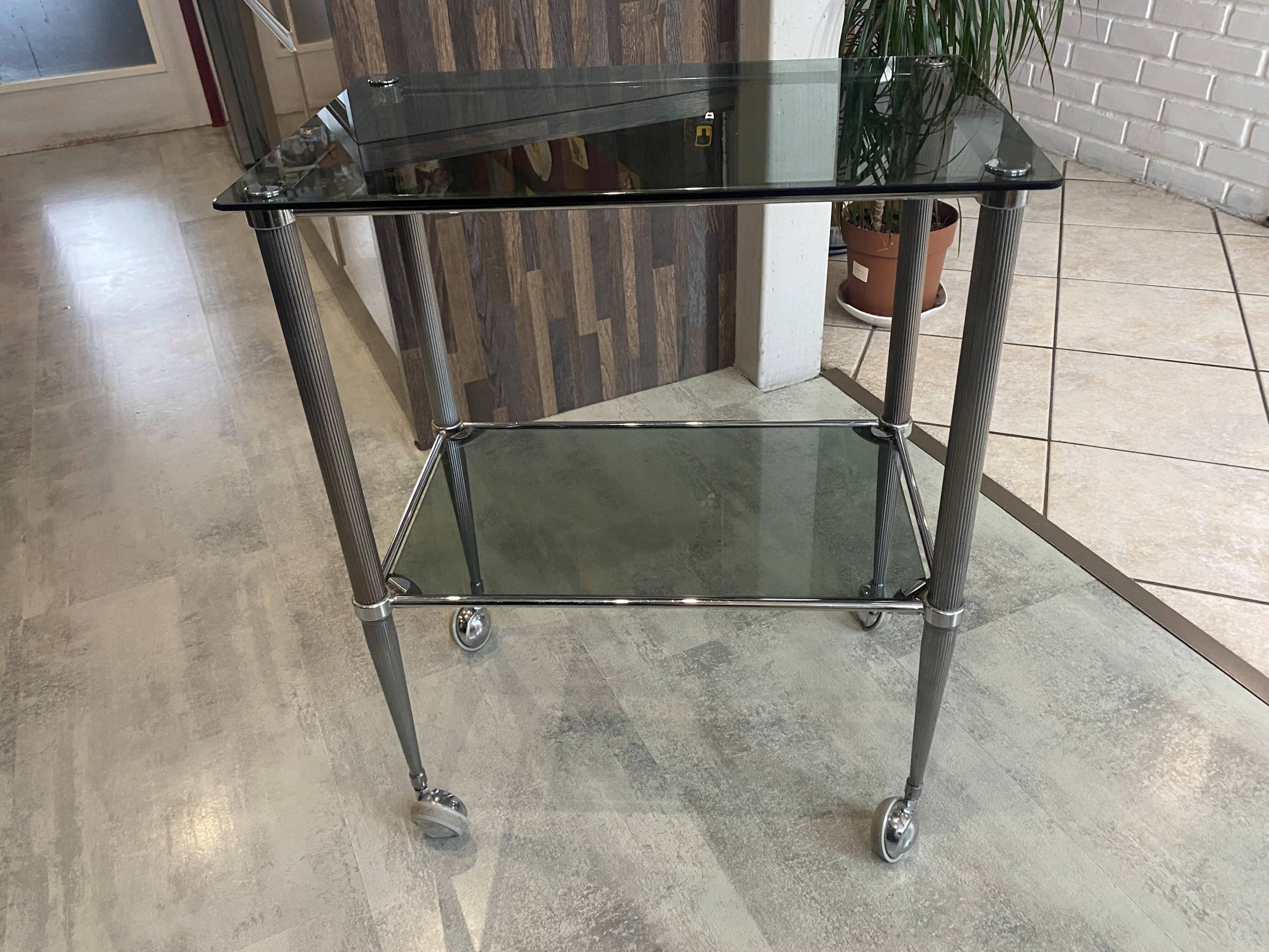 Vintage 1950s silver metal bar cart with wheels and two glass shelves