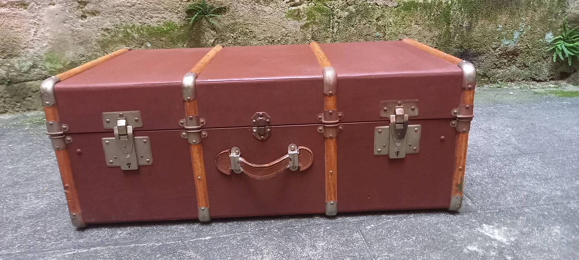Old trunk, travel suitcase, with carrying handles and interior lockers, wooden reinforcements