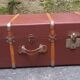 Old trunk, travel suitcase, with carrying handles and interior lockers, wooden reinforcements