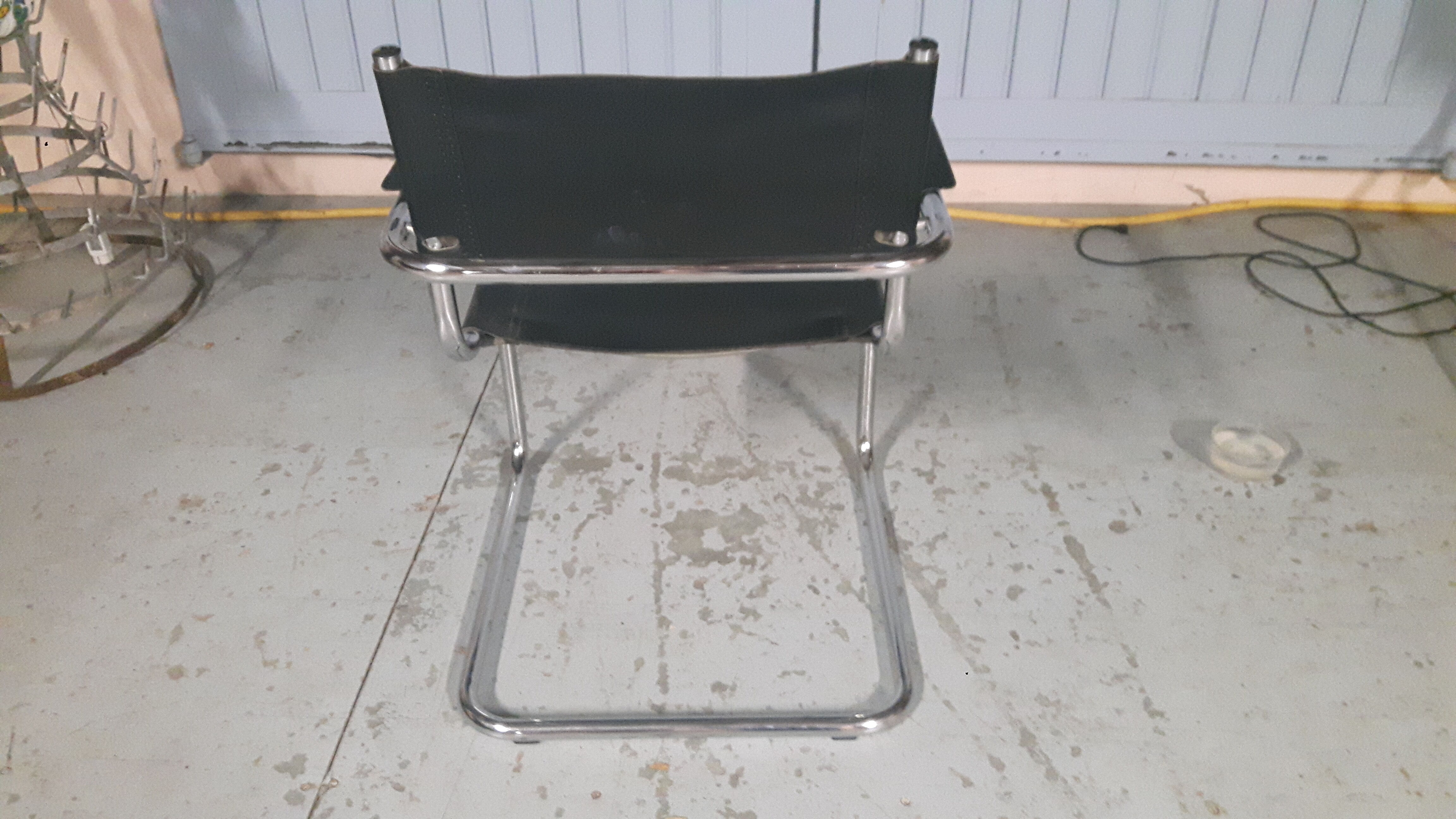 Chair black leather and chrome