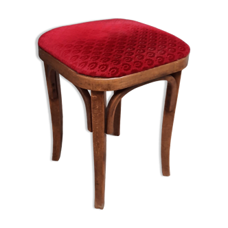 Curved wooden stool