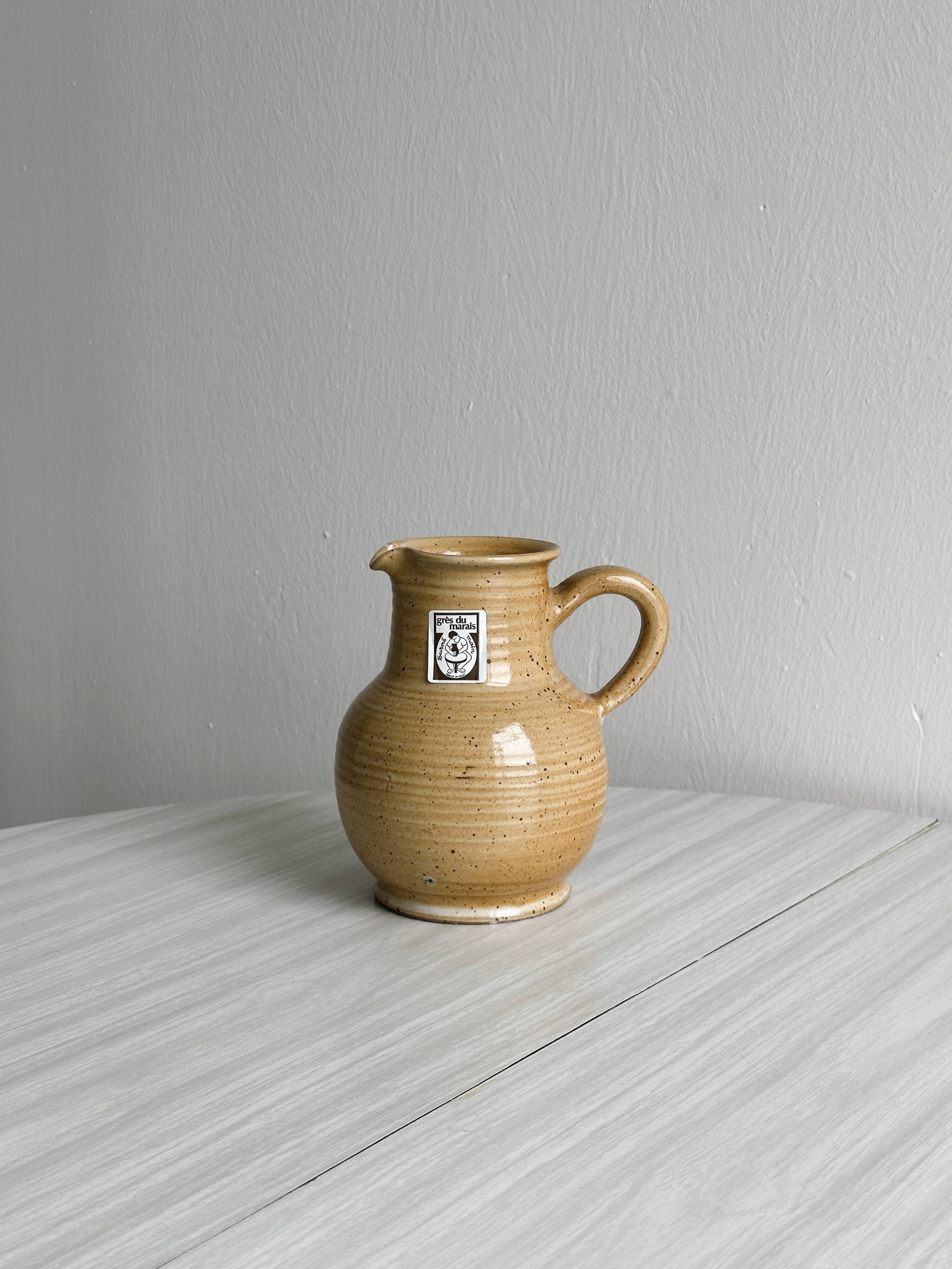 Hand-thrown ceramic pitcher