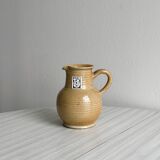 Hand-thrown ceramic pitcher