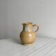 Hand-thrown ceramic pitcher