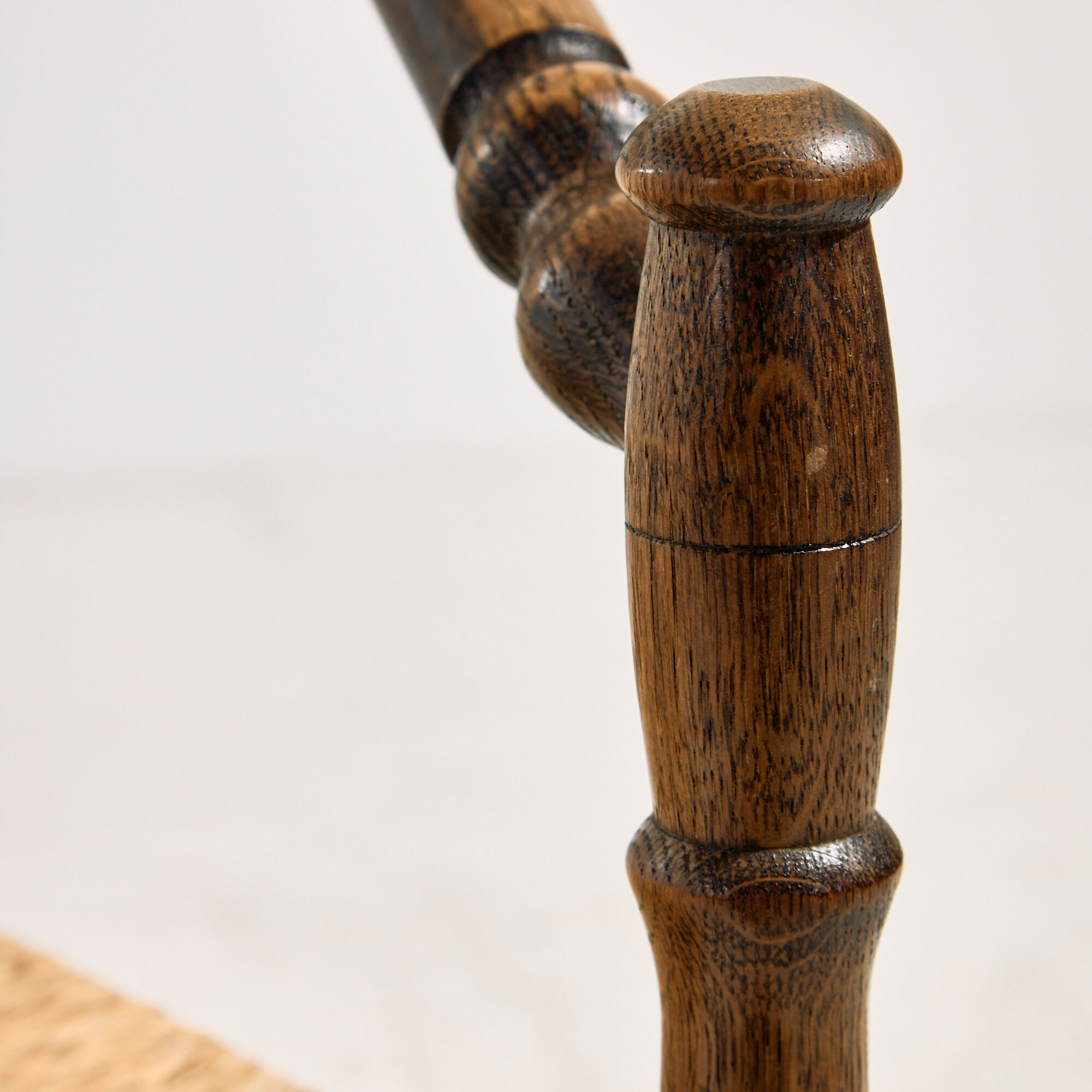 Oak armchair with three legs