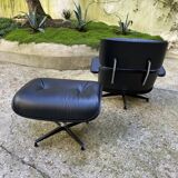 Charles Eames all-black lounge chair and ottoman, Herman Miller edition