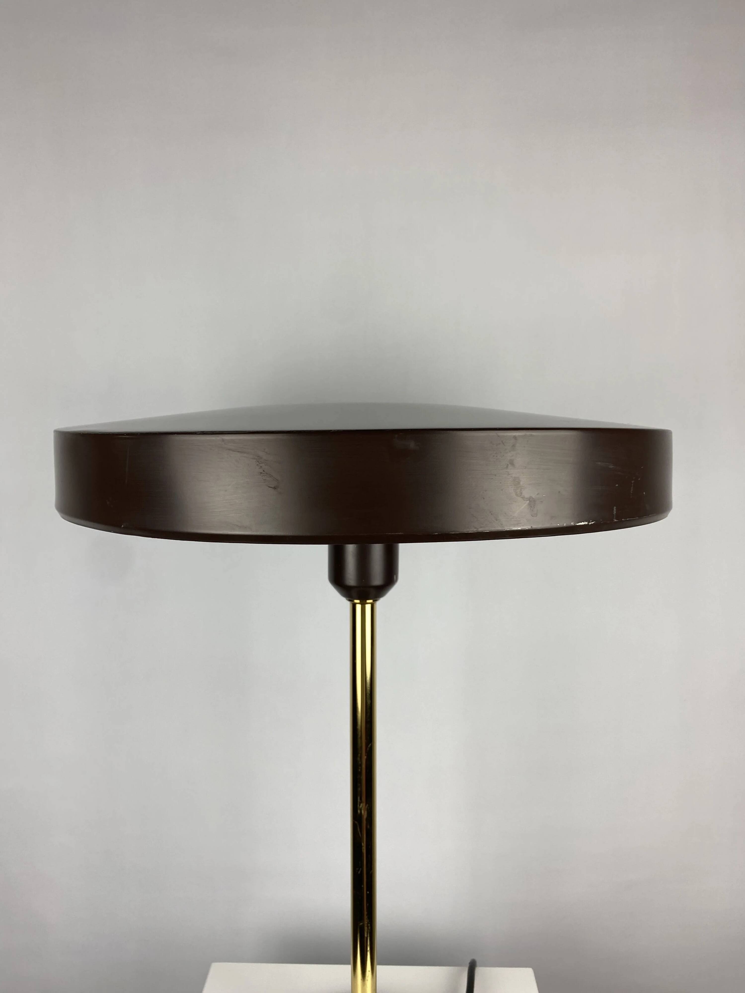 One of the four brown and gold Timor 69 table lamps by Louis Kalff for Philips 1970.