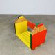 Modular wall-mounted pencil shelf in Pierre Sala style, for children.
