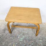 Old curved wooden children's desk.