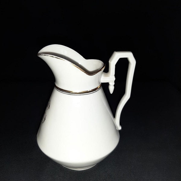 Porcelain sweetener and milk jug with cipher