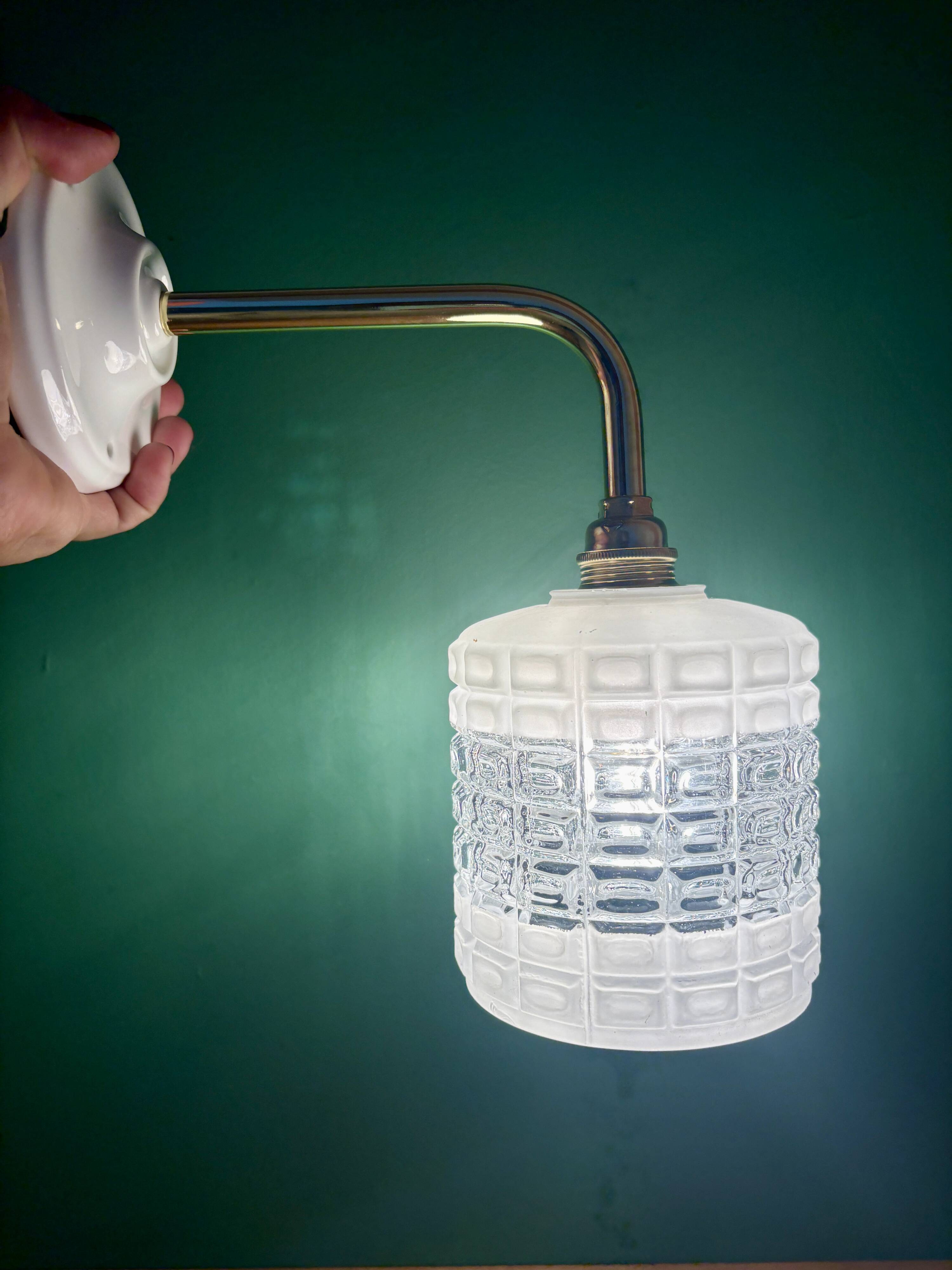 Vintage globe angled wall light in white and clear glass