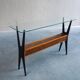 1950s Italian ebonized console table with glass top & lattice basket