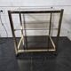Brass and smoked glass side table from the 70s