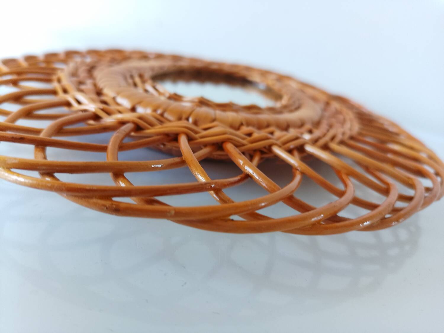 Woven rattan mirror