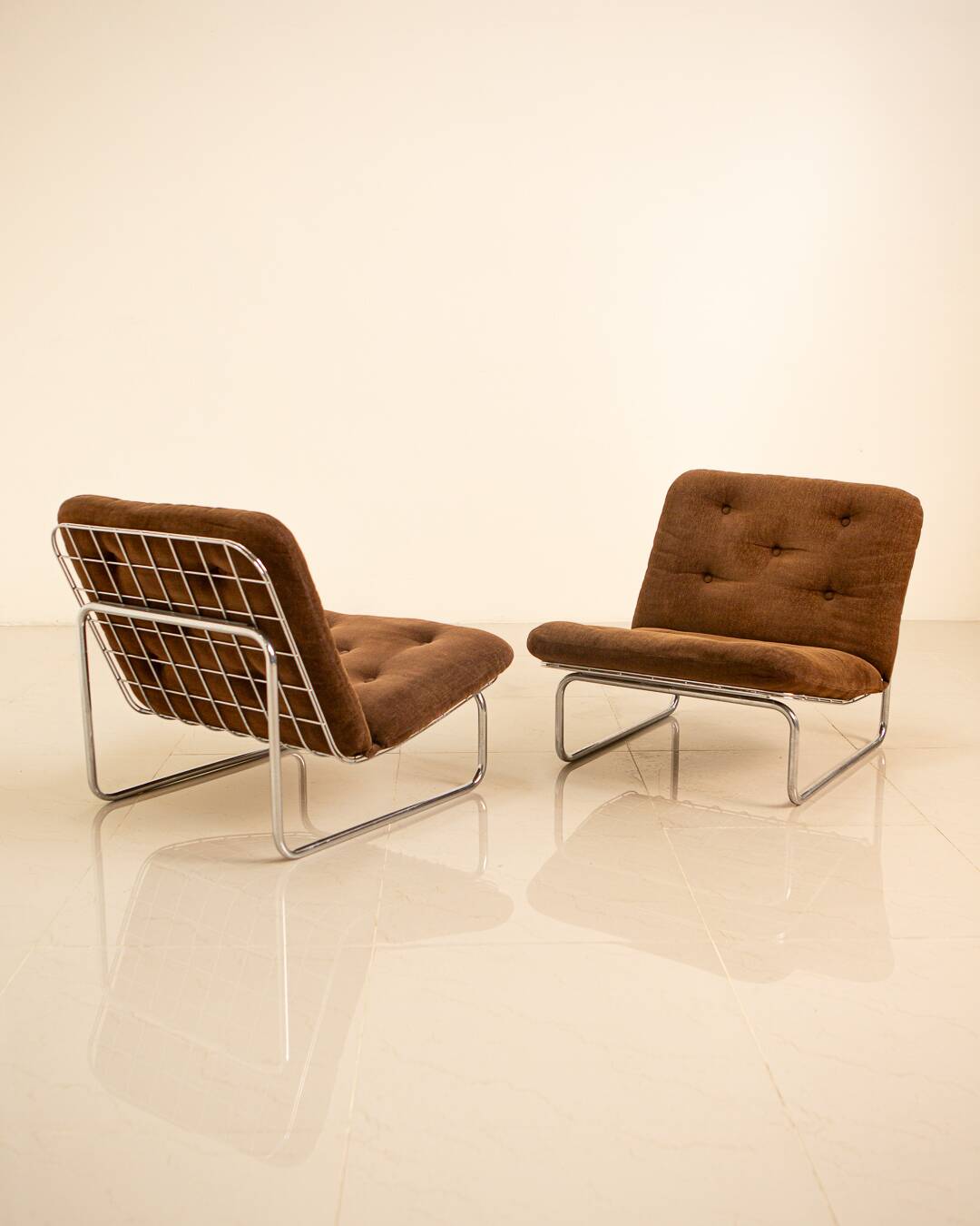 Pair of brown "666" low chairs by Kho Liang for Artifort 70's