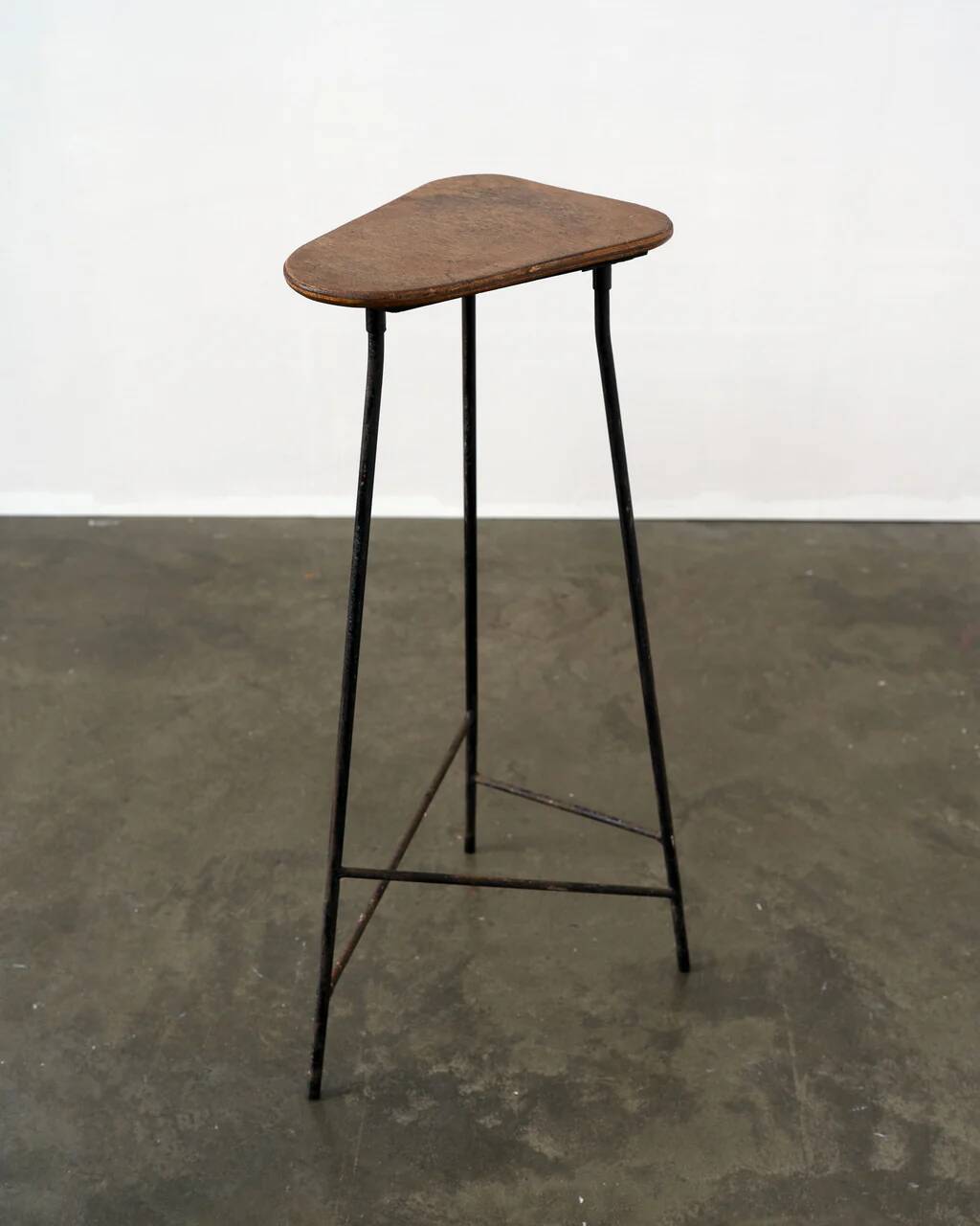 Modernist iron tripod pedestal / stool