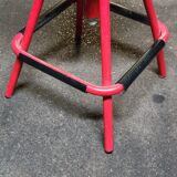 Red stool with industrial vintage screw 80s
