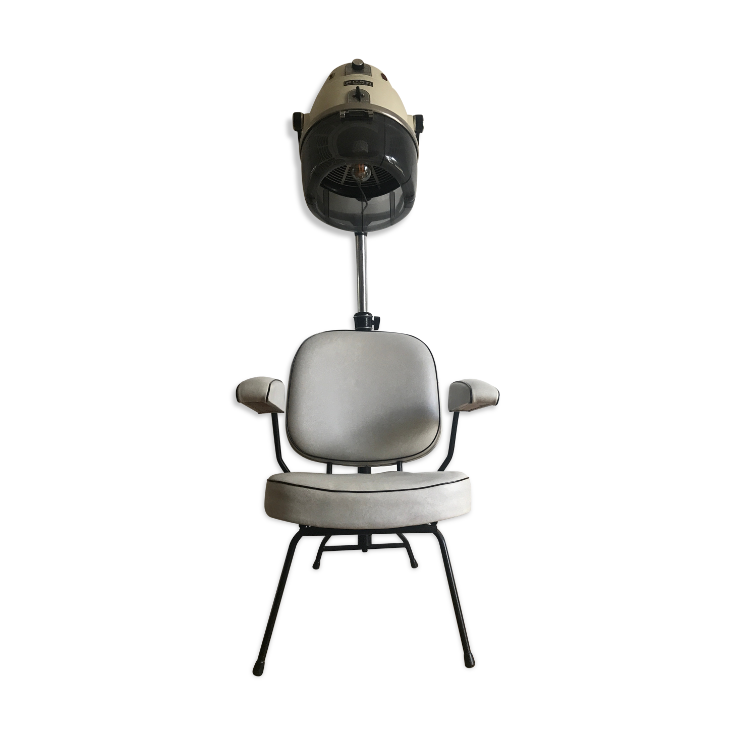 Vintage hairdresser's armchair with helmet transformed into a lamp