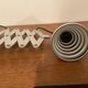 Industrial accordion wall light