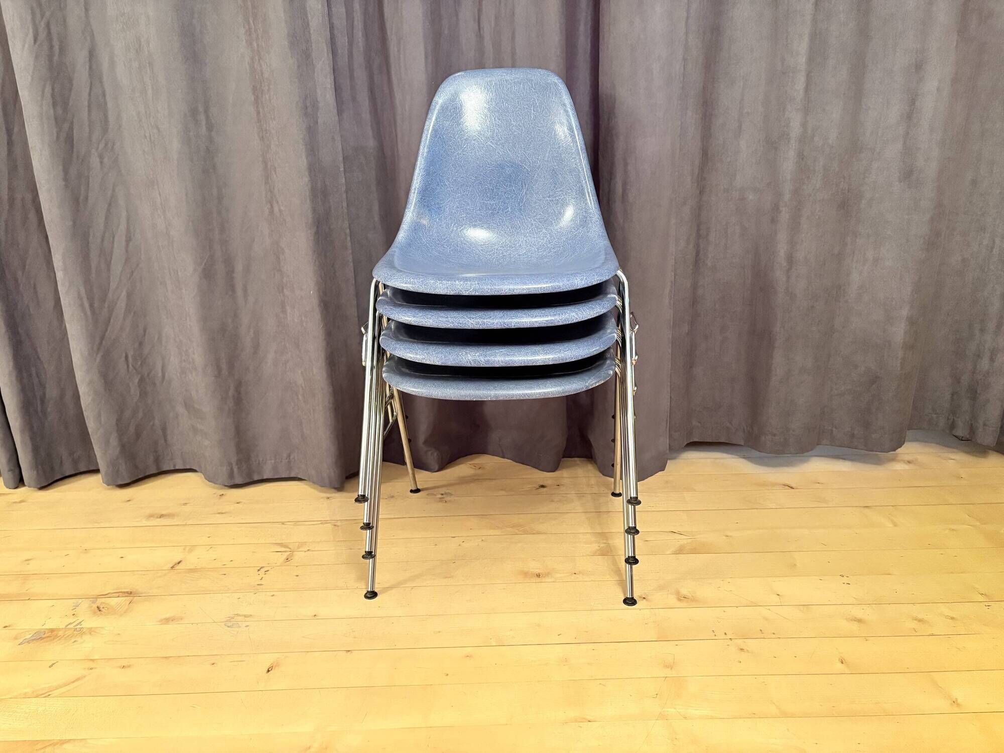 Set of four DSS chairs, fiberglass, designed by Charles and Ray Eames, Herm