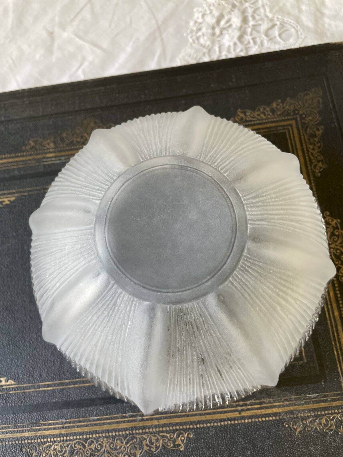 Thick transparent and opalescent glass cup