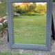 Pair of large sculpted mirrors in painted grey wood, antique style (1900s)