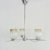 Vintage chandelier with 3 branches in chrome metal and glass globe. Year 70