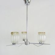Vintage chandelier with 3 branches in chrome metal and glass globe. Year 70