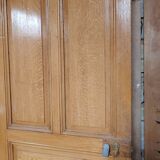 Old communication door with wood effect paint
